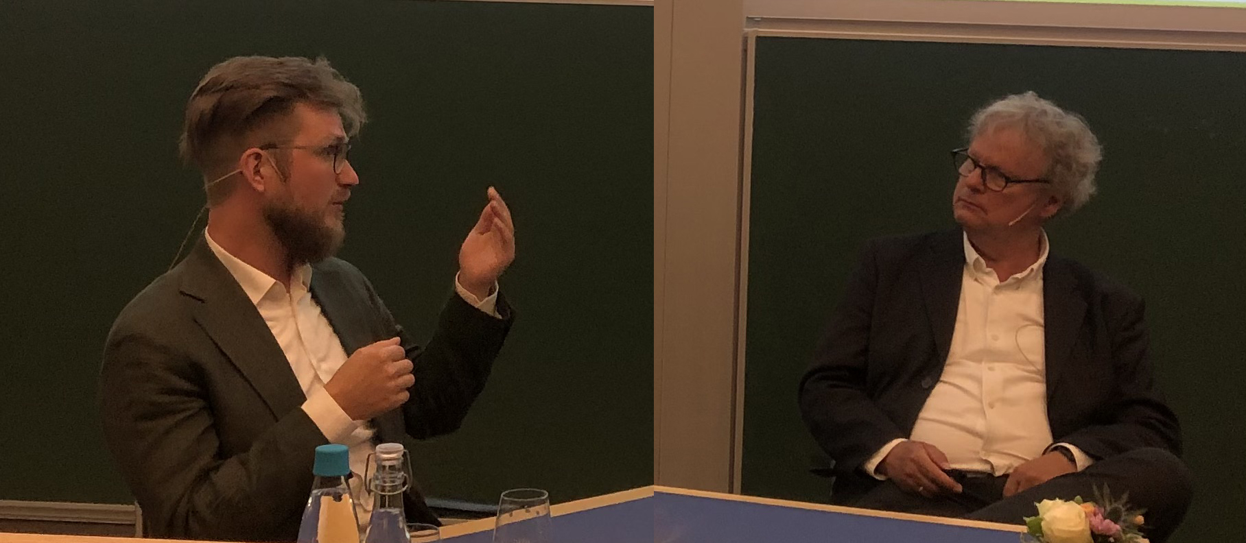 Clemens Klante pratar med Rolf Davig Vogt från Norsk Institutt for Vannforskning vid disputationen 9 juni 2023